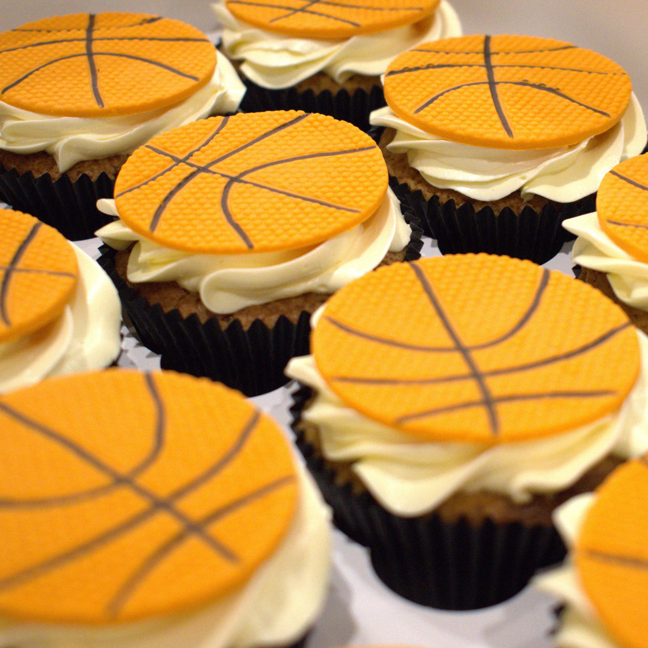 Basketball Themed Cupcakes – Sweet Essence Cakes and Desserts